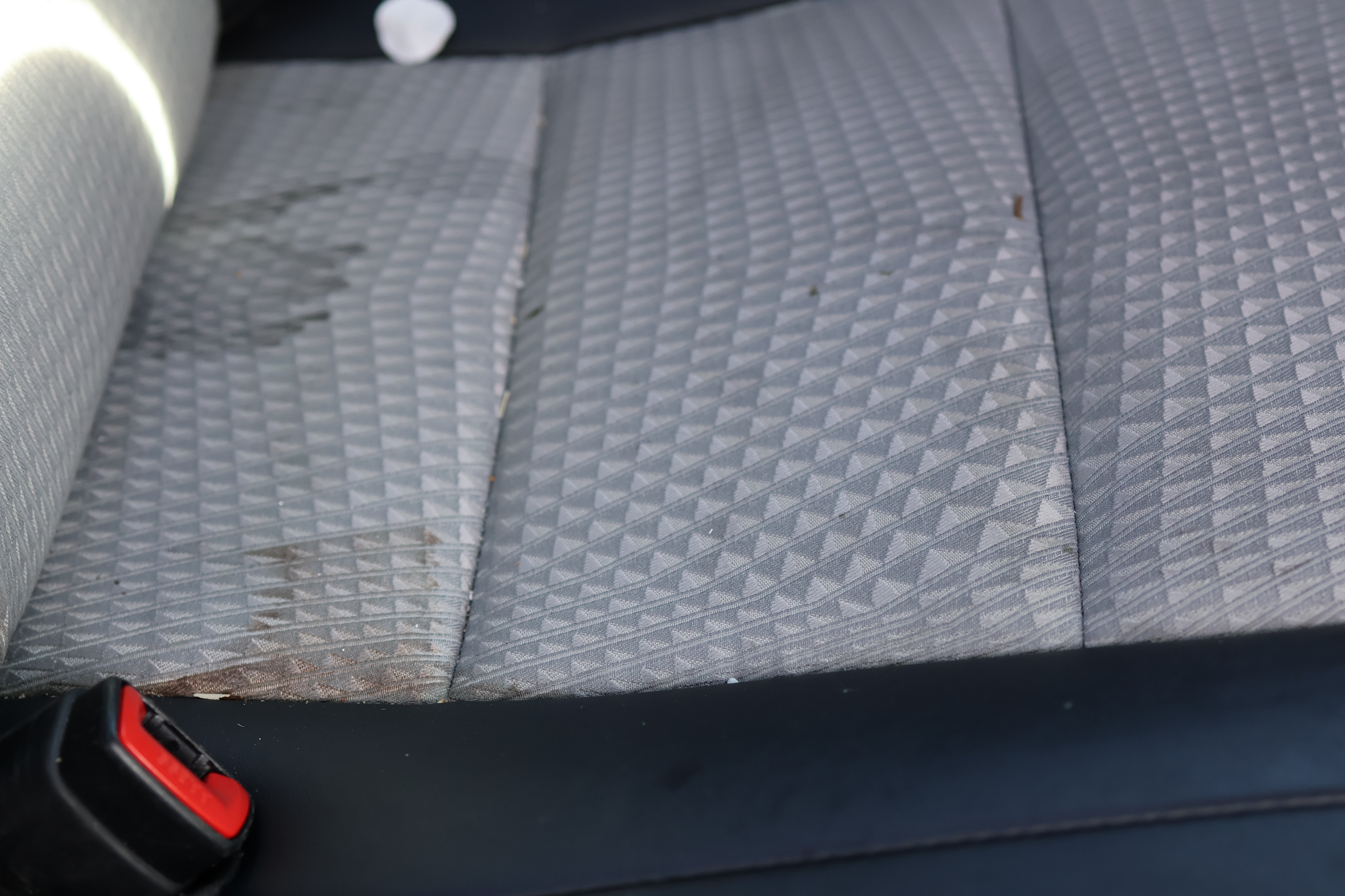 Camry Rear Seat Before - Chocolate Milk Stain