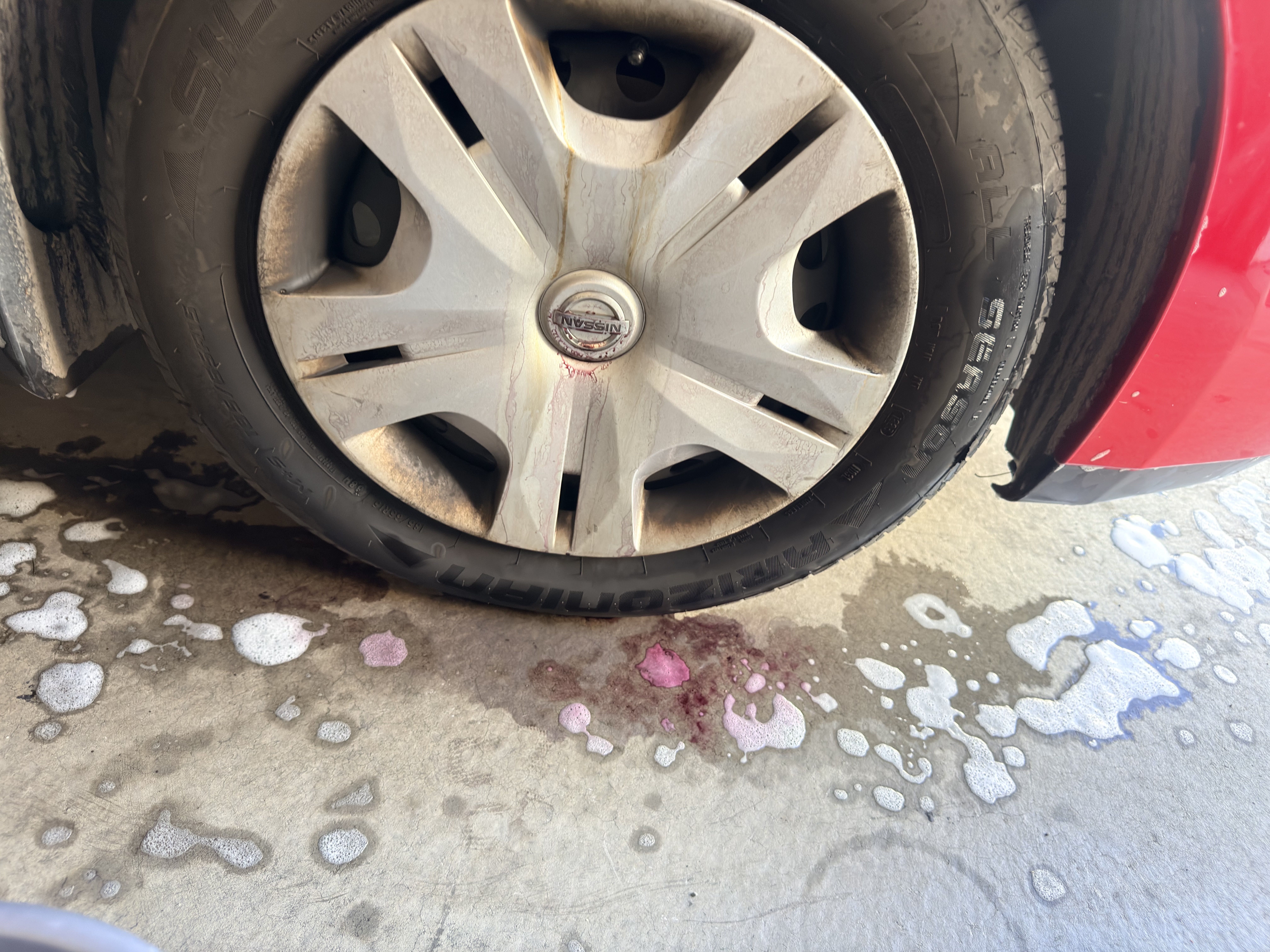 Nissan Versa wheel after cleaning - clean and refreshed